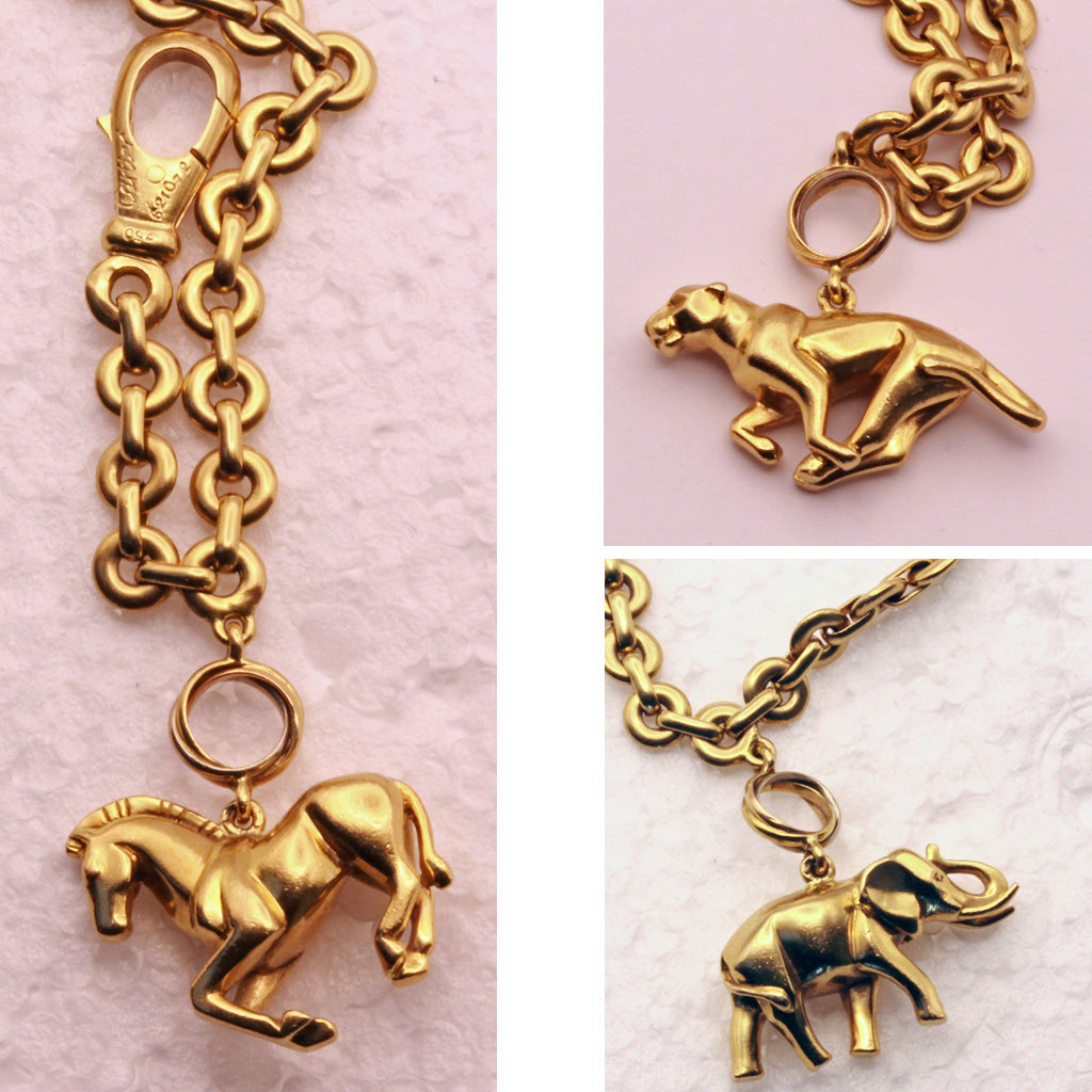 Cartier charm bracelet 18k gold panther elephant horse Trinity