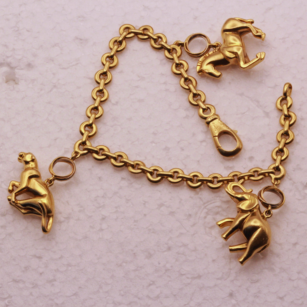 Cartier 18kt Gold Charm Bracelet