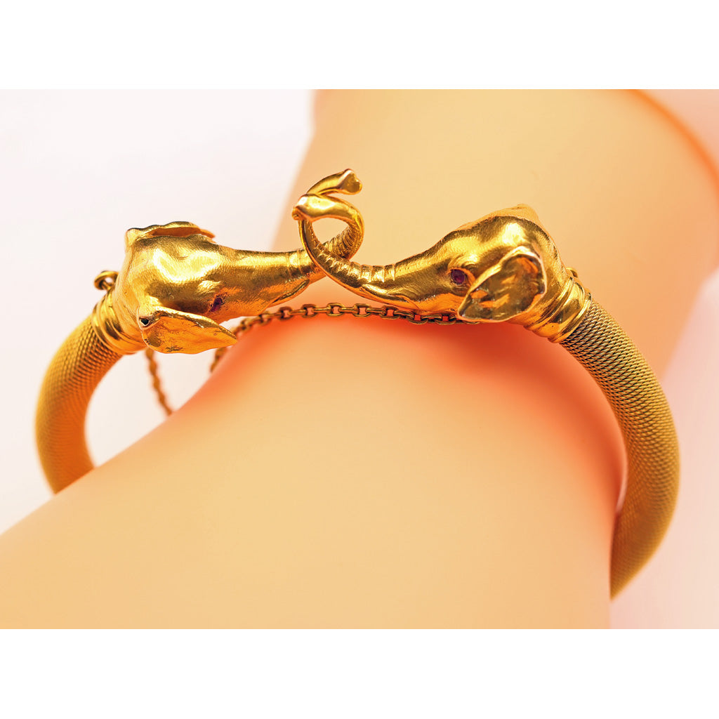 Antique bangle 18k gold bracelet elephants English Signed lucky luxury on arm of model